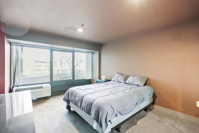 300 Riverfront Dr Unit 300/4C, Detroit, MI 48226 - carpeted bedroom featuring a wall mounted air conditioner