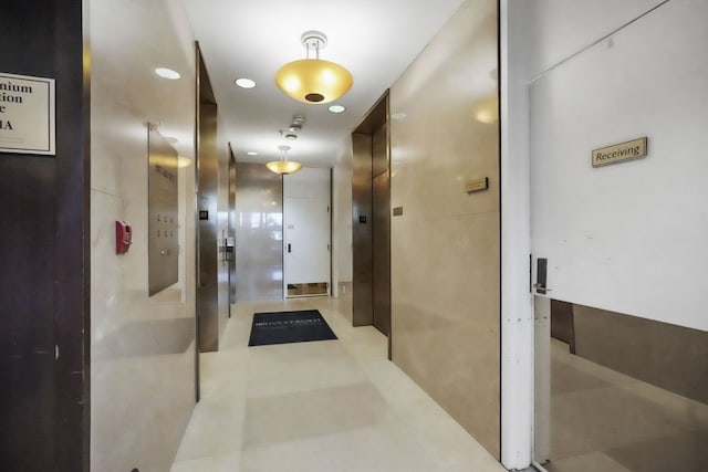 300 Riverfront Dr Unit 300/4C, Detroit, MI 48226 - hallway with tile patterned flooring