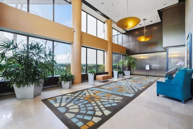300 Riverfront Dr Unit 300/4C, Detroit, MI 48226 - lobby featuring a towering ceiling
