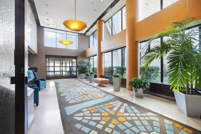 300 Riverfront Dr Unit 300/4C, Detroit, MI 48226 - common area with a towering ceiling and recessed lighting