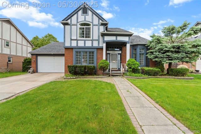 441 Parkview Dr, Detroit, MI 48214 - tudor home with brick siding, a front lawn, an attached garage, driveway, and roof with shingles