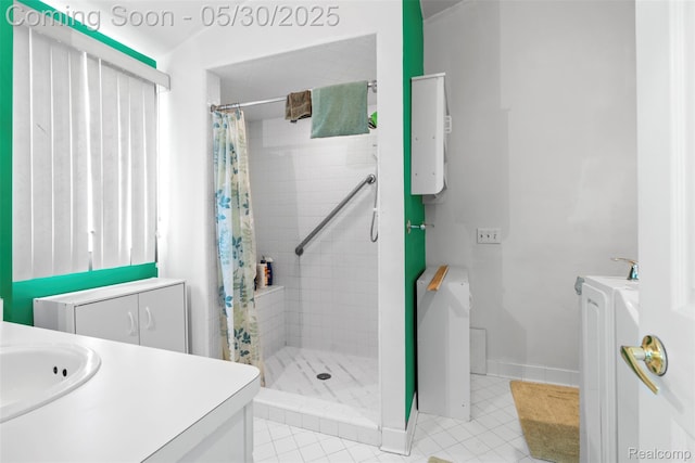 441 Parkview Dr, Detroit, MI 48214 - full bath with vanity, a shower stall, tile patterned flooring, and water heater