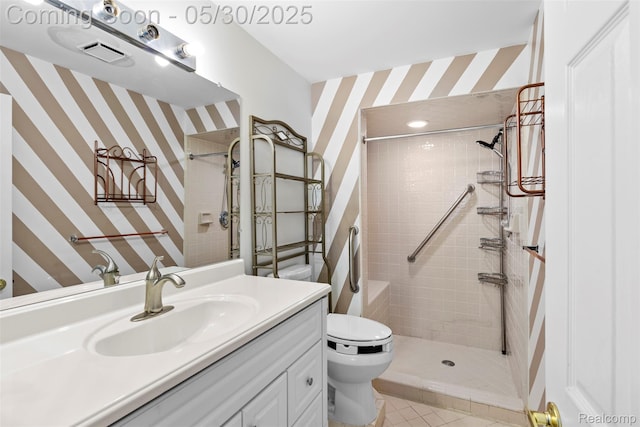 441 Parkview Dr, Detroit, MI 48214 - bathroom featuring wallpapered walls, toilet, a tile shower, vanity, and tile patterned floors