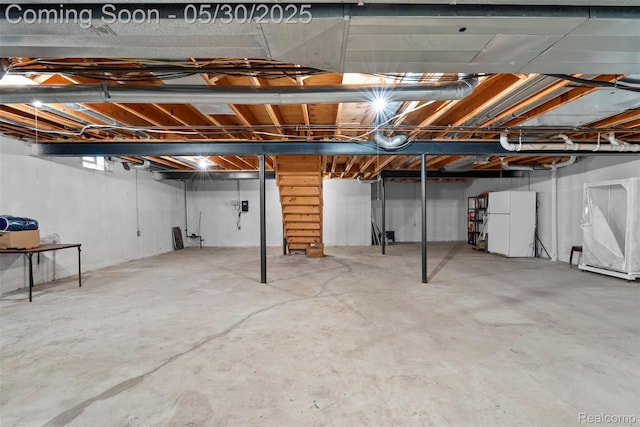 441 Parkview Dr, Detroit, MI 48214 - unfinished below grade area with freestanding refrigerator