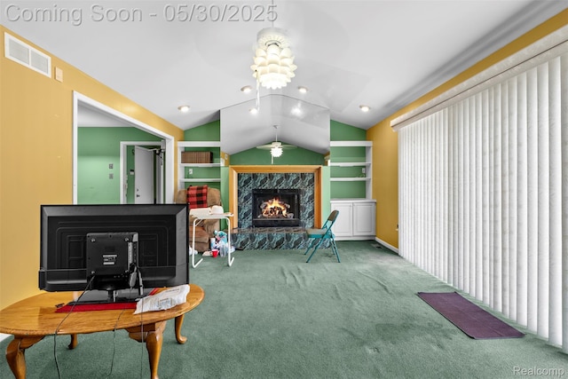 441 Parkview Dr, Detroit, MI 48214 - living room with a high end fireplace, carpet, vaulted ceiling, and a ceiling fan
