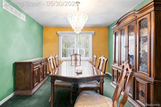 441 Parkview Dr, Detroit, MI 48214 - dining space with dark carpet, a chandelier, and baseboards