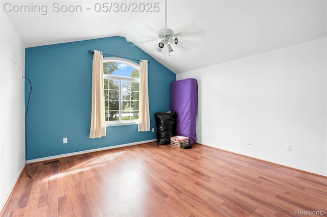 441 Parkview Dr, Detroit, MI 48214 - additional living space featuring ceiling fan, wood finished floors, and lofted ceiling