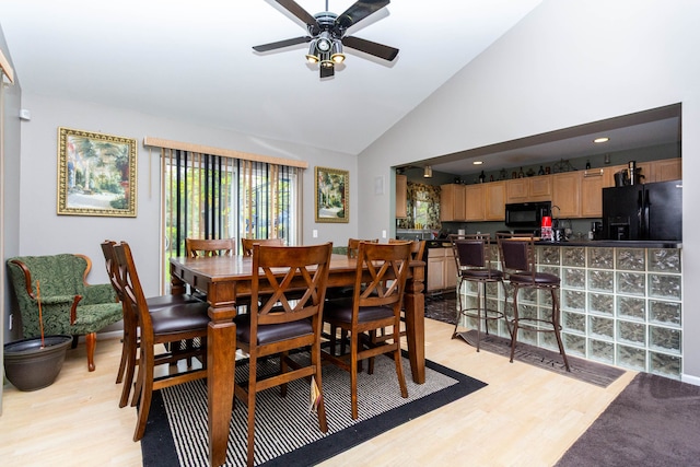 2761 Tomahawk Dr, Waterford, MI 48328 - dining room with light wood-type flooring, lofted ceiling, a ceiling fan, and recessed lighting