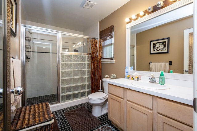 2761 Tomahawk Dr, Waterford, MI 48328 - full bathroom with a stall shower, toilet, vanity, and tile patterned floors