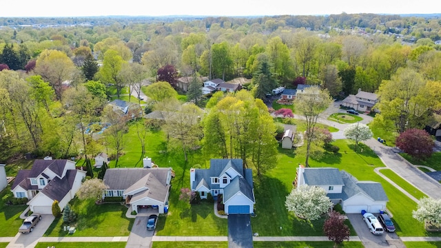 2761 Tomahawk Dr, Waterford, MI 48328 - aerial view of residential area featuring a forest