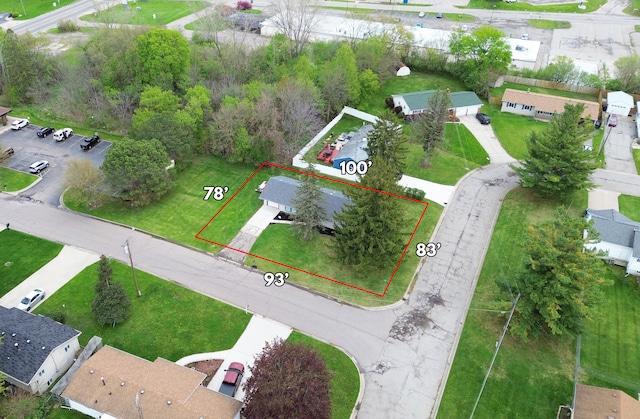 aerial view of property and surrounding area with property parcel outlined
