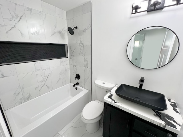 bathroom featuring marble look tile flooring, toilet, shower / bath combination, and vanity