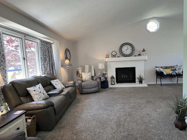 living room featuring lofted ceiling, carpet flooring, and a brick fireplace