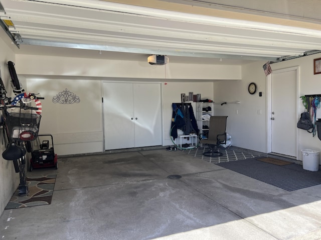 garage featuring a garage door opener