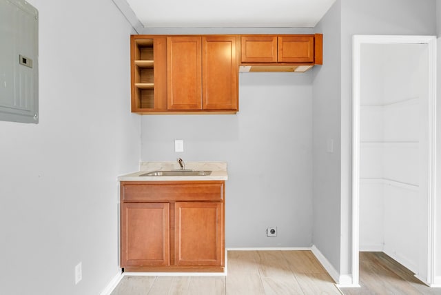 18250 Weaver St, Detroit, MI 48228 - clothes washing area with a sink, electric panel, baseboards, and hookup for an electric dryer