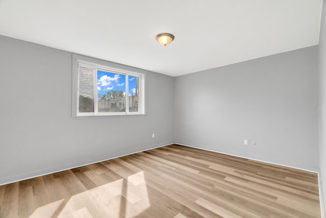 18250 Weaver St, Detroit, MI 48228 - unfurnished room with light wood-type flooring and baseboards