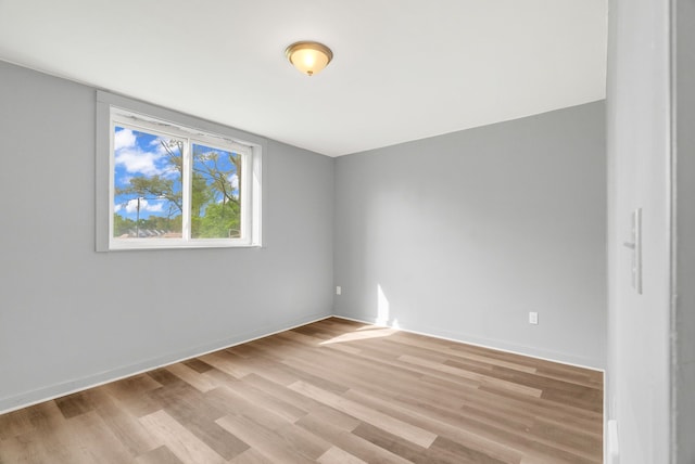 18250 Weaver St, Detroit, MI 48228 - empty room with light wood-type flooring and baseboards