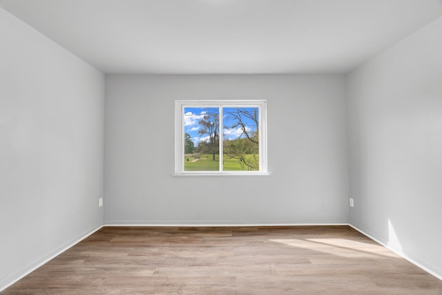 18250 Weaver St, Detroit, MI 48228 - empty room with wood finished floors and baseboards