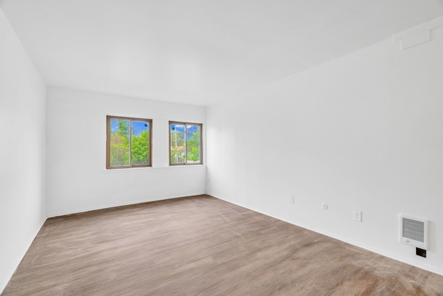 18250 Weaver St, Detroit, MI 48228 - unfurnished room with wood finished floors and baseboards