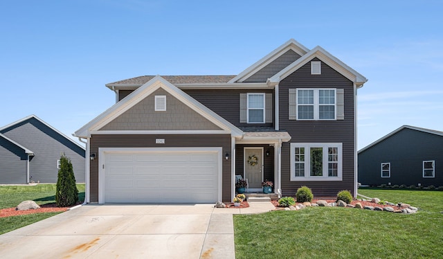 3242 Hill Hollow Ln, Howell, MI 48855 - view of front of property featuring concrete driveway, a front lawn, and a garage