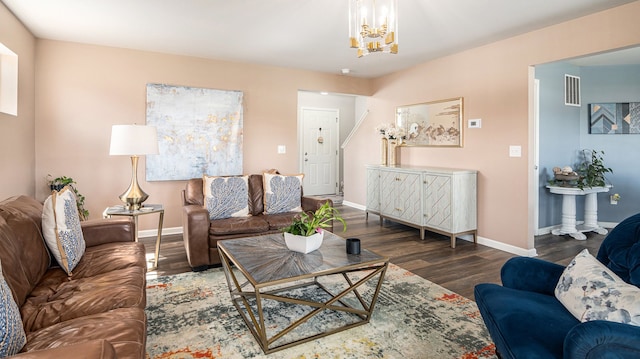 3242 Hill Hollow Ln, Howell, MI 48855 - living room featuring a chandelier, wood finished floors, and baseboards