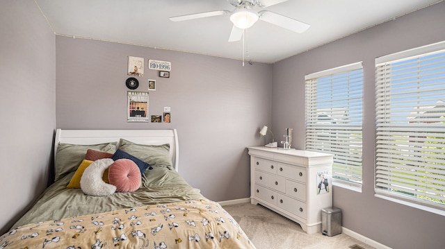 3242 Hill Hollow Ln, Howell, MI 48855 - bedroom featuring light carpet, baseboards, and a ceiling fan