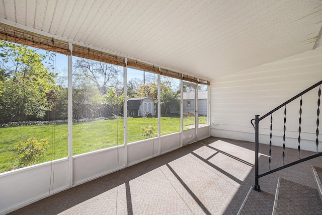 615 Garber Rd, North Muskegon, MI 49445 - unfurnished sunroom featuring lofted ceiling