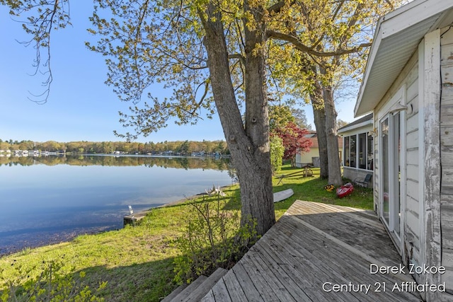 771 Sunny Trl, Greenville, MI 48838 - deck with a water view and a lawn