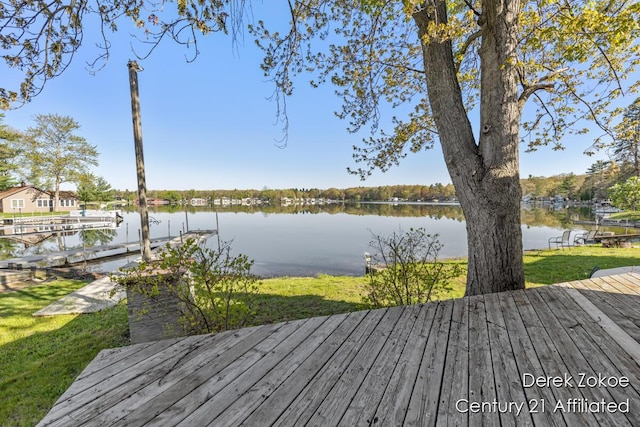 771 Sunny Trl, Greenville, MI 48838 - wooden deck with a water view and a lawn