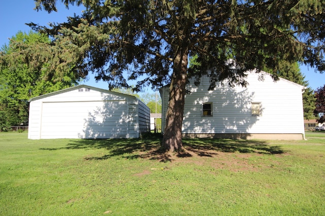 13687 W Tremblay Dr, Vicksburg, MI 49097 - view of green lawn featuring an outbuilding