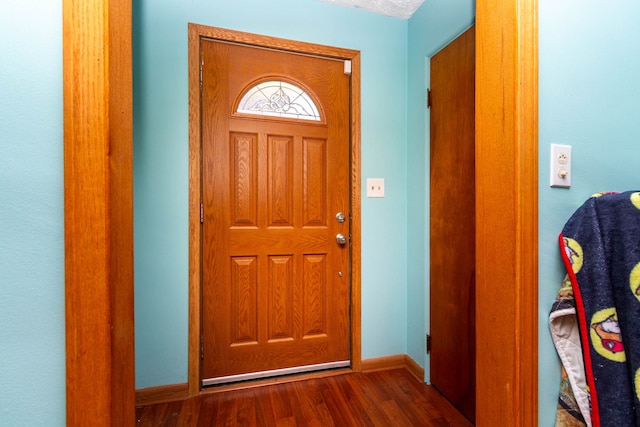 1119 Lambert Dr, Holly, MI 48442 - foyer with wood finished floors and baseboards