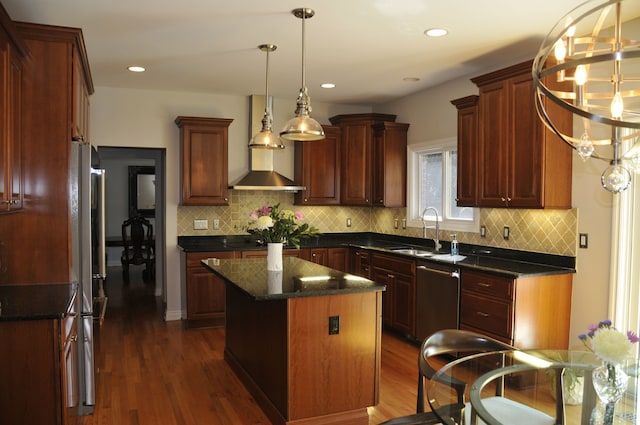 kitchen featuring a sink, appliances with stainless steel finishes, dark wood-style floors, backsplash, and recessed lighting