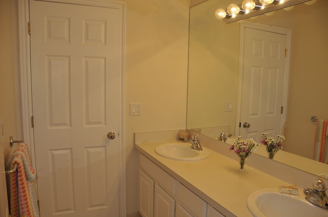 full bath featuring double vanity