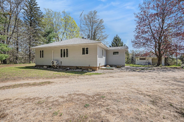 3771 E Loop Rd, Hesperia, MI 49421 - view of front of home featuring roof with shingles and crawl space