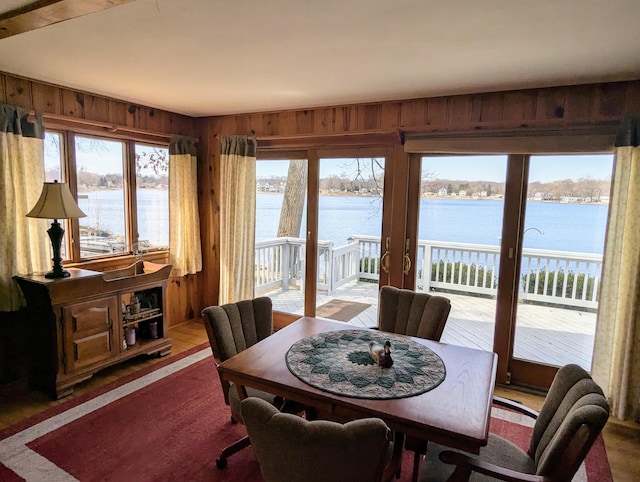 63568 Zabel Shores Rd, Sturgis, MI 49091 - dining room with a water view and wood walls
