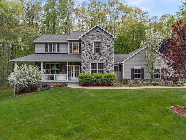 3135 Walnut Hls, Leonard, MI 48367 - view of front facade featuring stone siding, a porch, a front lawn, and roof with shingles