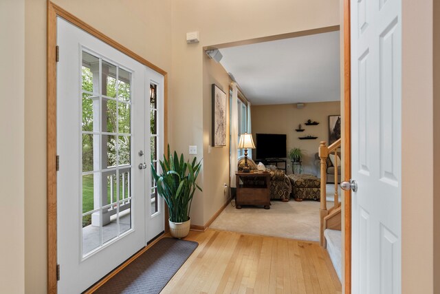 3135 Walnut Hls, Leonard, MI 48367 - doorway to outside featuring hardwood / wood-style floors and baseboards