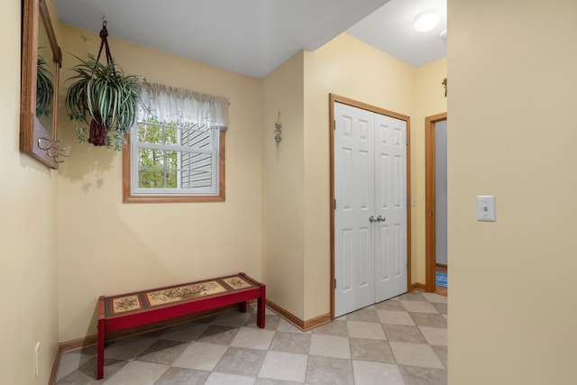3135 Walnut Hls, Leonard, MI 48367 - foyer entrance featuring baseboards and light floors