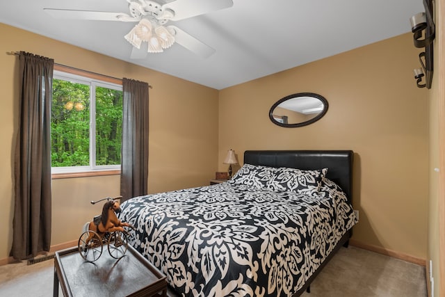 3135 Walnut Hls, Leonard, MI 48367 - bedroom featuring carpet, baseboards, and ceiling fan