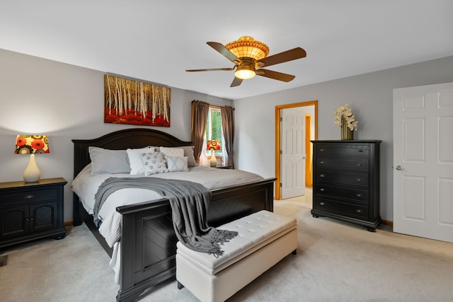 3135 Walnut Hls, Leonard, MI 48367 - bedroom with light carpet, a ceiling fan, and baseboards
