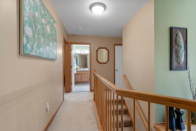 3135 Walnut Hls, Leonard, MI 48367 - hall with an upstairs landing and light colored carpet