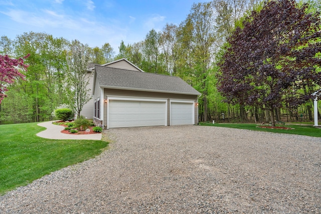 3135 Walnut Hls, Leonard, MI 48367 - garage featuring driveway