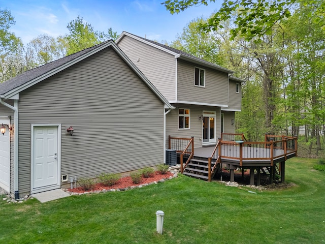 3135 Walnut Hls, Leonard, MI 48367 - rear view of house with a yard, a deck, and central AC unit