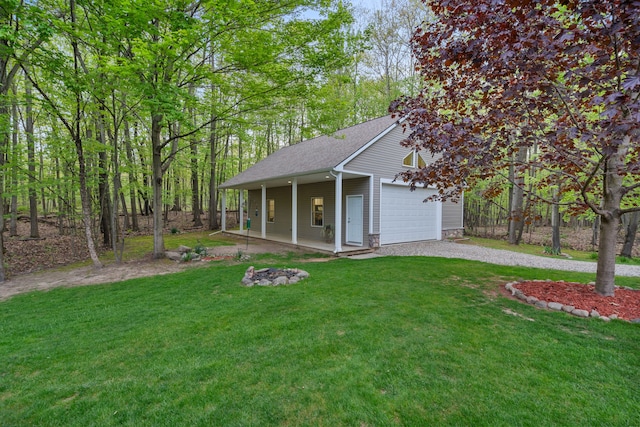 3135 Walnut Hls, Leonard, MI 48367 - view of front of home featuring covered porch, driveway, a shingled roof, a front lawn, and stone siding