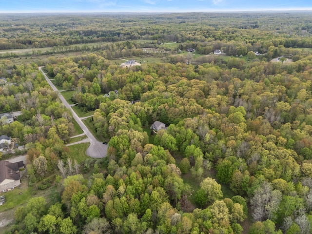 3135 Walnut Hls, Leonard, MI 48367 - aerial overview of property's location featuring a heavily wooded area