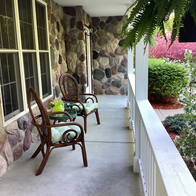 3135 Walnut Hls, Leonard, MI 48367 - balcony featuring covered porch