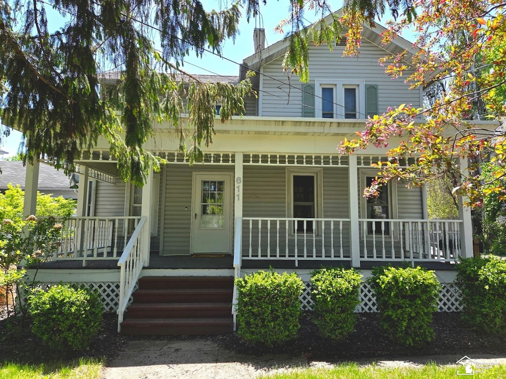 farmhouse inspired home featuring a porch