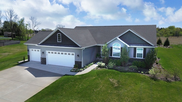 9466 Heritage, Goodrich, MI 48438 - view of front of house featuring an attached garage, stone siding, driveway, and a front yard