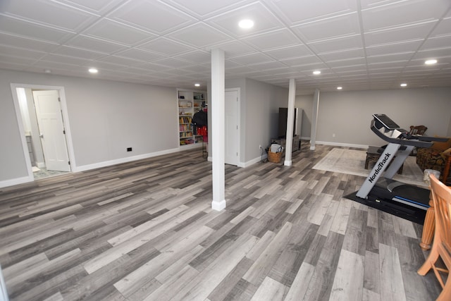 9466 Heritage, Goodrich, MI 48438 - workout area with recessed lighting, baseboards, and wood finished floors
