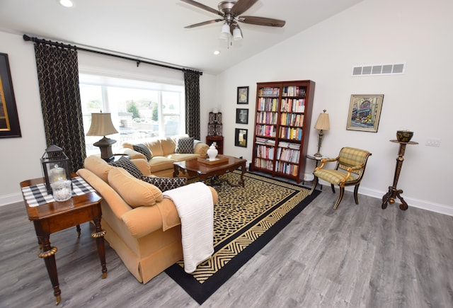 9466 Heritage, Goodrich, MI 48438 - living room with lofted ceiling, ceiling fan, baseboards, wood finished floors, and recessed lighting